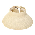 Beige straw visor hat on a white background