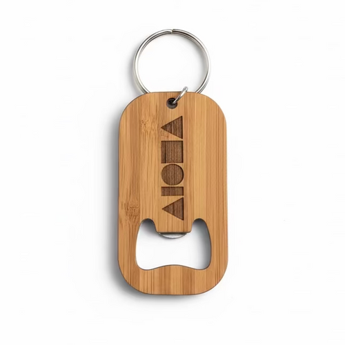 Wooden keychain with bottle opener and engraved logo on a white background