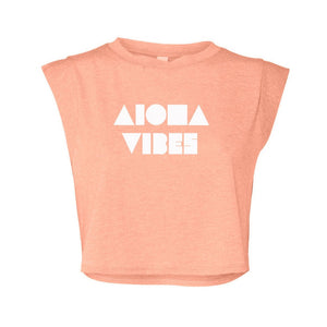 Womens cropped festival tank in peach screen printed on front with Aloha Vibes Shapes logo on front in white