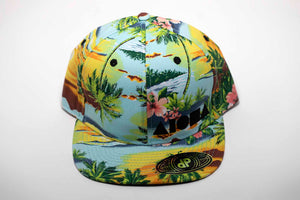 Adult flat brim snapback hat with tropical paradise fabric all over. Embroidered with black Aloha Shapes ® logo