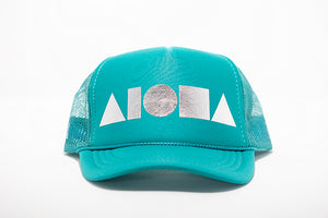 Turquoise youth foam trucker hat foil printed with metallic silver Aloha Shapes ® logo