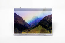 Stu Soley fine art acrylic block showing a rainbow spanning a tropical valley in Maui Hawaii