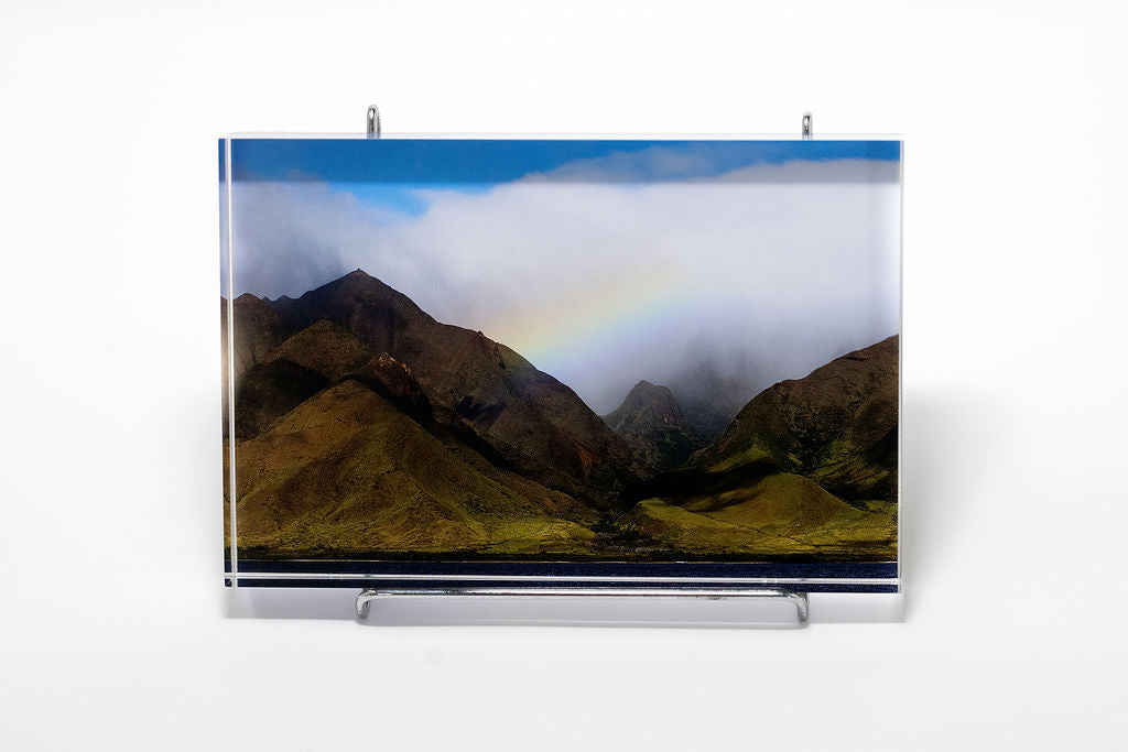 Stu Soley fine art acrylic photo block showing a tropical valley in Maui Hawaii spanned by a rainbow