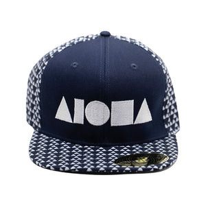 Navy blue & white triangle pattern adult flatbrim snapback hat embroidered with large white Aloha Shapes ® logo