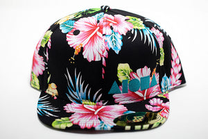 Tropical floral print adult flat brim snapback hat embroidered in Maui Hawaii with blue aloha shapes logo