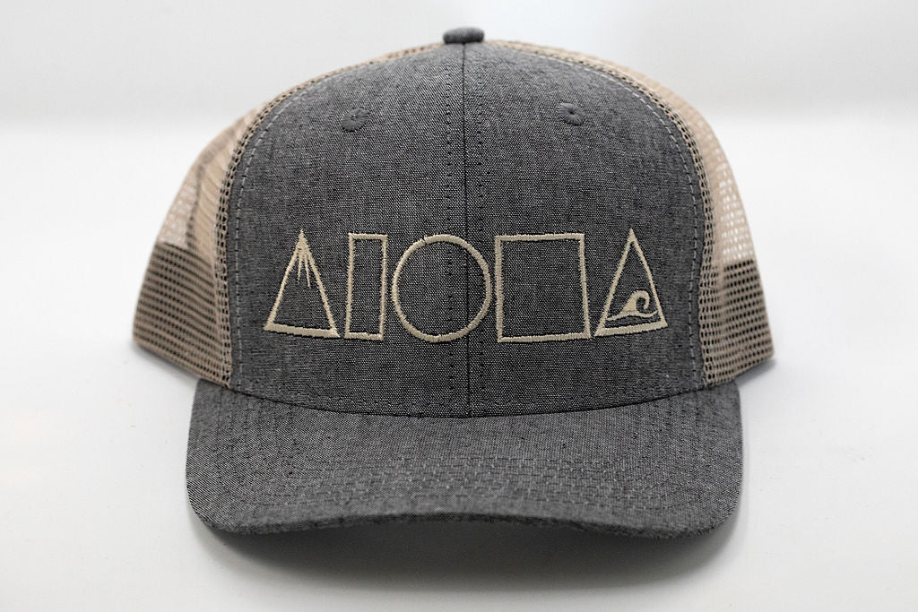 Grey denim curved bill snapback hat with tan mesh back panels embroidered in Maui Hawaii with Mauka to Makai Aloha Shapes logo in tan