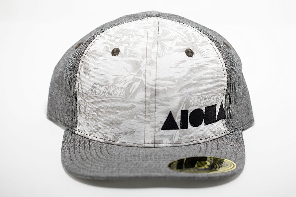 Grey denim and white tropical fabric adult flat brim snapback hat embroidered with black Aloha Shapes ® logo
