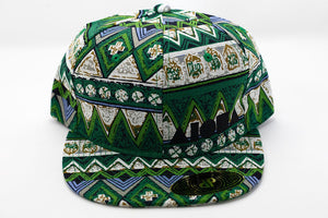 Green & Brown triangle/striped pattern fabric adult flatbrim snapback hat embroidered in Maui Hawaii with black Aloha Shapes logo