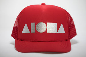 Youth foam trucker hat. Red brim and foam front panel foil printed with silver ALOHA Shapes ® logo. Red mesh back panels. 