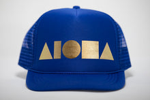 Youth foam trucker hat. Blue bill. Blue foam front panels with gold foil print Aloha Shapes® logo. Blue mesh back panels.