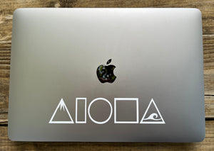 Laptop computer with a Mauka to Makai Aloha Shapes decal sticker in white stuck on the top