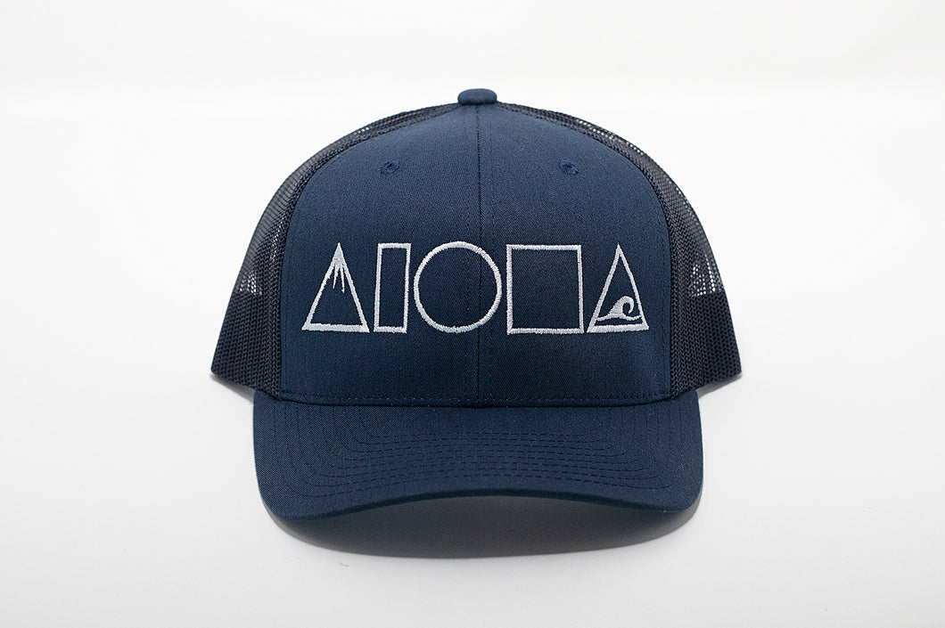 Navy blue adult curved bill snapback hat embroidered with Mauka to Makai Aloha Shapes logo on front in white