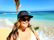 Customer photo wearing Mauka to makai seven panel snapback on the beach in Maui, Hawaii