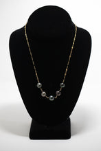 Necklace 14 karat gold fill with five Tahitian pearls strung between spacers. handmade in Maui, Hawaii
