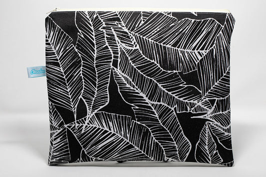 wet/dry bag with black/white banana leaf pattern. handmade in maui, hawaii