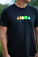 Closeup of adult unisex black heather tee printed with rainbow Aloha Shapes logo