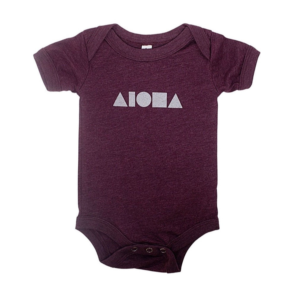 Heather maroon baby onesie screen printed on front with aloha Shapes® logo in metallic silver. Made on Maui, hawaii