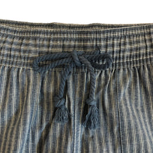closeup detail of elastic waistband and cotton drawstring tie