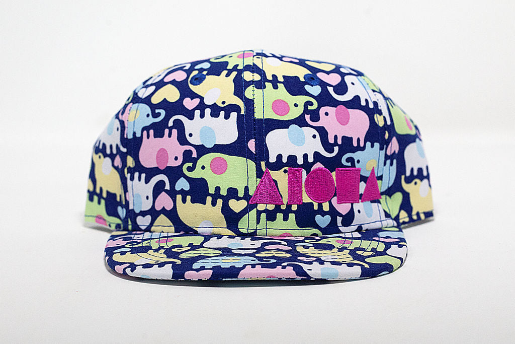 Elephant print fabric toddler flat brim snapback hat embroidered with pink Aloha Shapes ® logo