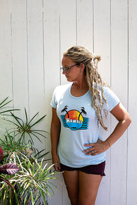 Person wearing Light blue womens fitted jersey tee printed on the front chest with our Vintage Hawaii logo.