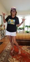 woman wearing Cartoon drawing of west side Maui beach surf spot designed in Big Island Hawaii and printed in Maui, Hawaii throwing shakas